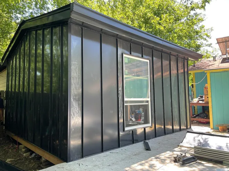 Black standing seam metal wall panels for Roof Inspection in Redan