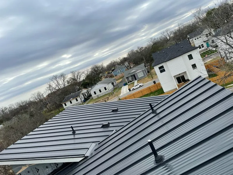 Standing seam metal roof panels with vents for Skylight Repair in Redan